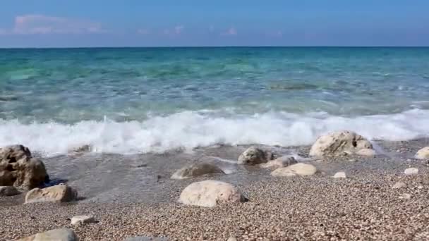 White Marble Pebble Stones Beach Azure Clear Bright Waves Close — Stock Video