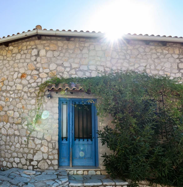 Sun Shining Greek Traditional House Roof Stone Walls Blue Doors — Stock Photo, Image