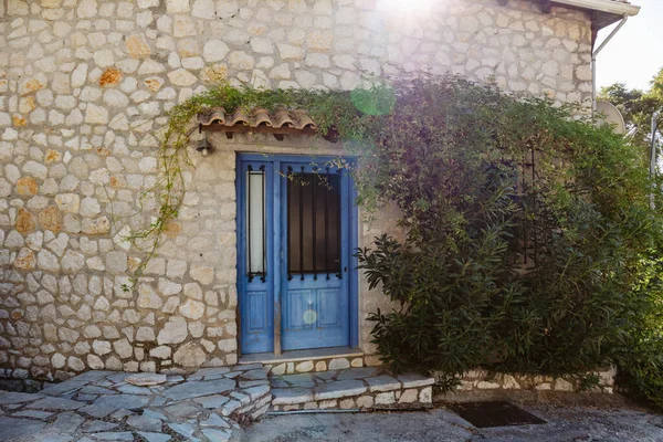 Sun Shining Greek Traditional House Roof Stone Walls Blue Doors — Stock Photo, Image