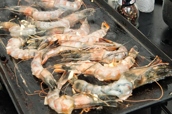 Fresh seafood shrimp prepared on the barbecue grill