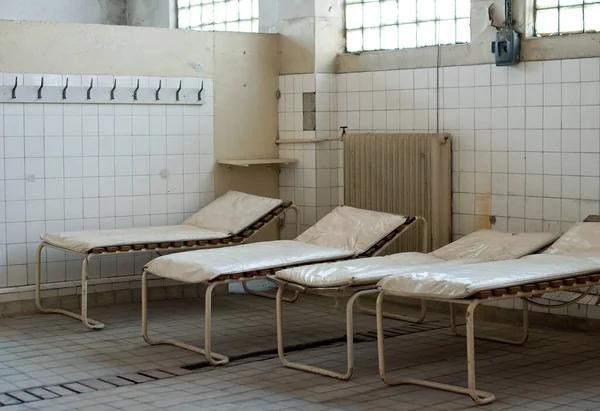 Locker room of an old industrial factory: Relaxation loungers, massage room