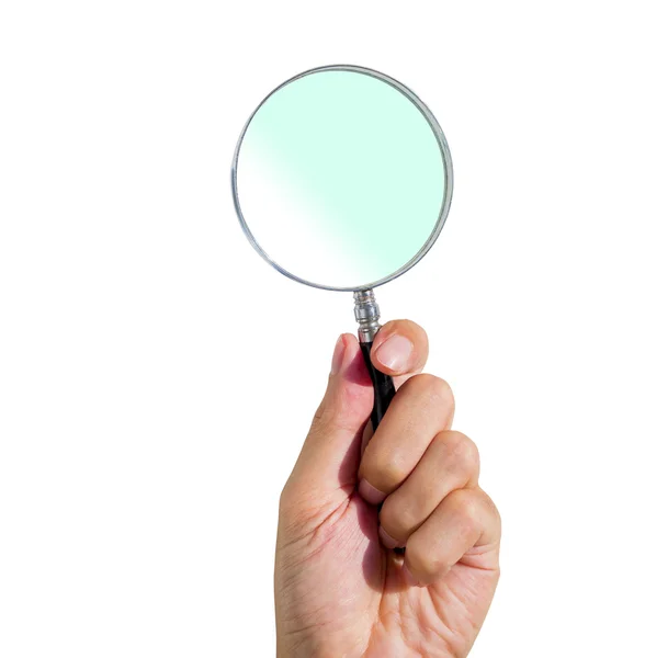 Man's hand holding magnifying glass — Stock Photo, Image