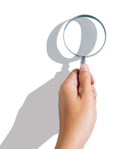 Man's hand holding magnifying glass — Stock Photo, Image