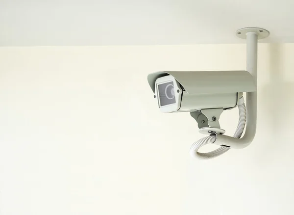 Cctv camera installed on ceiling in indoor security system — Stock Photo, Image