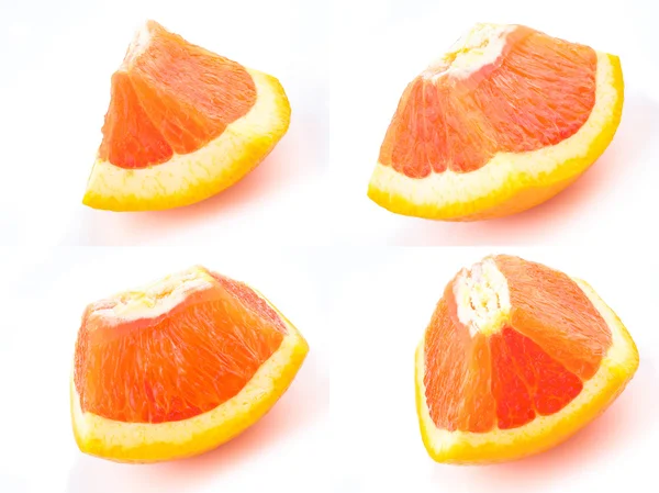 Fruta madura en rodajas de naranja aislada sobre fondo blanco —  Fotos de Stock