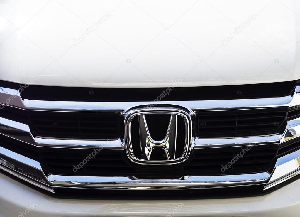 BANGKOK - AUGUST 23, 2014: Logo of Honda car in use on Bangkok, Thailand. Honda is a Japanese public multinational corporation and manufacturer of automobiles.