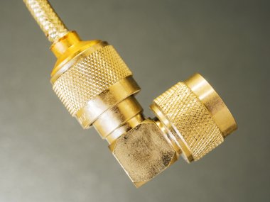 brass N-type connector in head of coaxial clipart