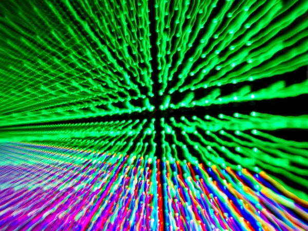 Lens zoom technic on green led panel, — Stock Photo, Image