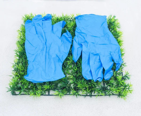 Guantes de goma azul —  Fotos de Stock