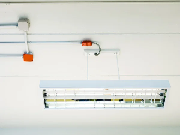 Fluorescence tube installed on ceiling — Stock Photo, Image