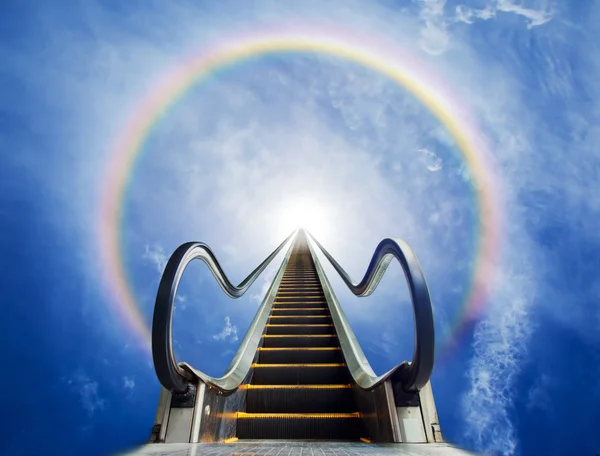 Escalator leading to the sun — Stock Photo, Image