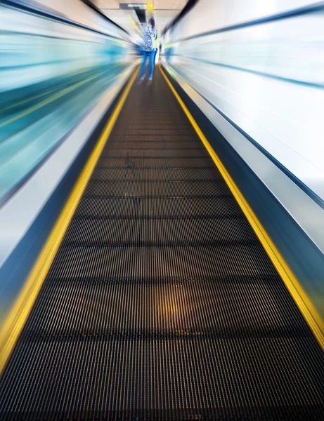 The escalator leading forward to next floor — Stock Photo, Image