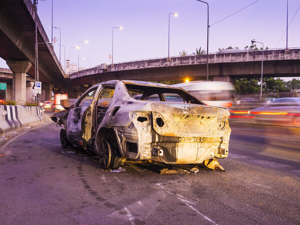 car wreck damaged by fire in accident