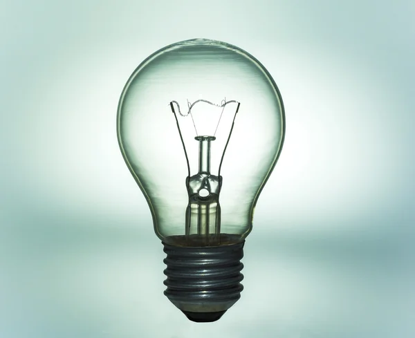 Light bulb on Silhouette shape — Stock Photo, Image