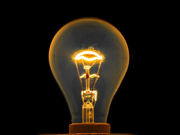 Glowing light bulb by electrical current — Stock Photo, Image