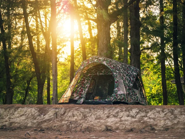 Recreational camping tents on sunset background — Stock Photo, Image