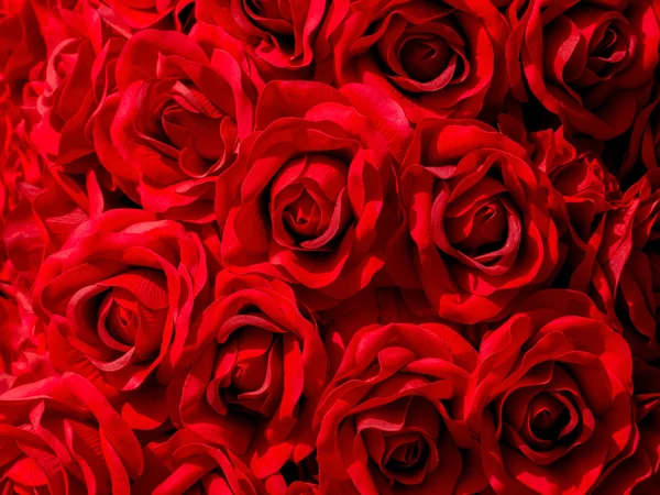 人工の赤いバラのテクスチャ背景 — ストック写真