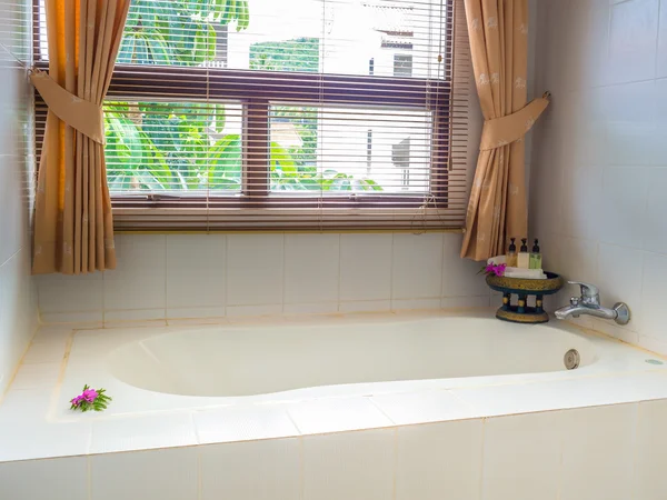 home decorated bath in front of window