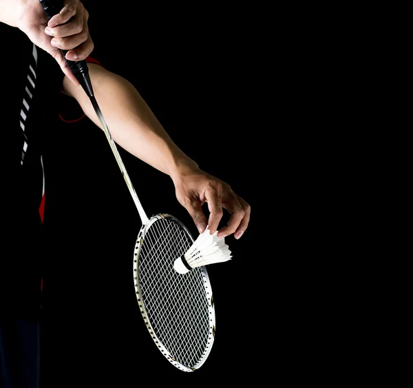 Badminton player holding racket and shuttlecock — Stock Photo, Image