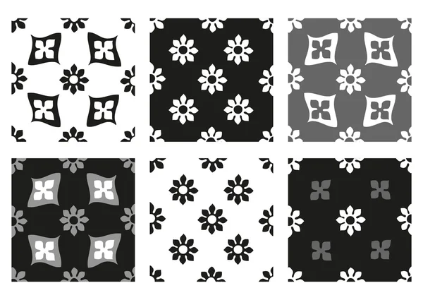 Vector set of seamless floral patterns black and white vintage backgrounds — Stockvector