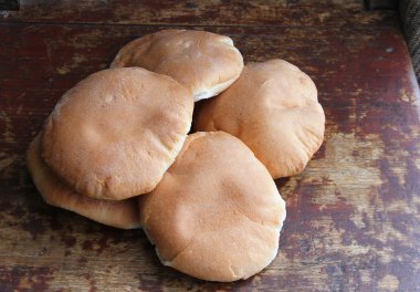 Pile of Fresh Bread Rounds clipart