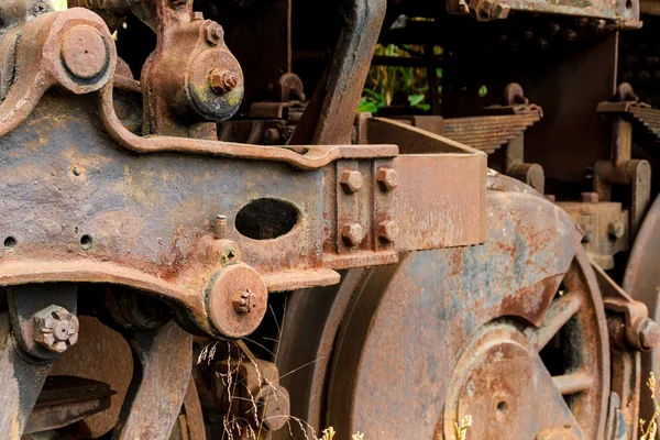 Close up wheels on abandoned steam powered locomotive. Royalty Free Stock Photos