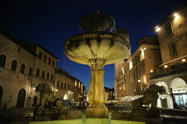 The Fountain in the town hall square in Assisi.