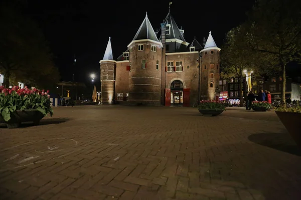 De stadslichten van Amsterdam in de nacht — Stockfoto