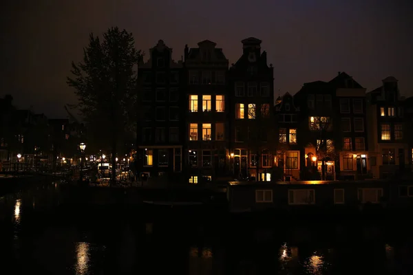 Městská světla Amsterdamu v noci — Stock fotografie