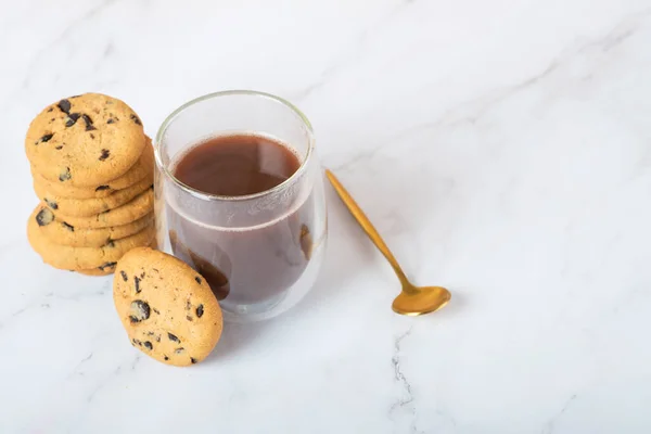 Cookies with chocolate drops on a white table — Stock Photo, Image