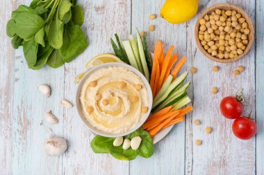 hummus with vegetables. Healthy vegetables and dip snack