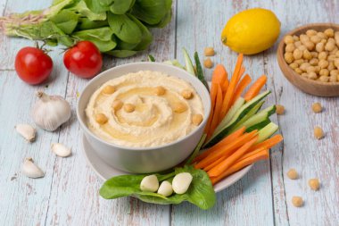 hummus with vegetables. Healthy vegetables and dip snack