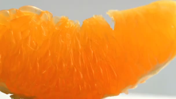 Orange pulp rotating closeup — Stok Video