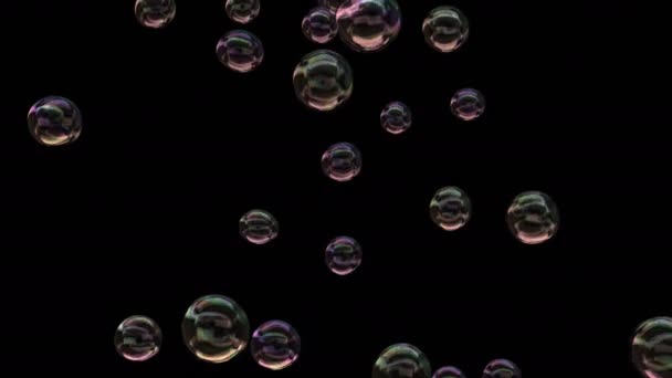 Mýdlové bubliny izolované na černém pozadí