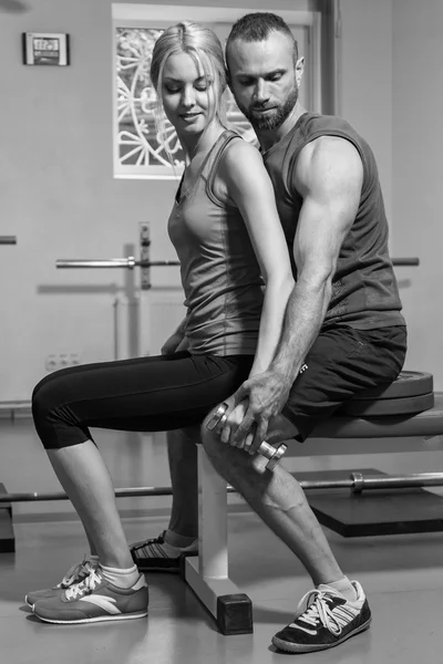 Sport couple on training in the gym. — Stock Photo, Image