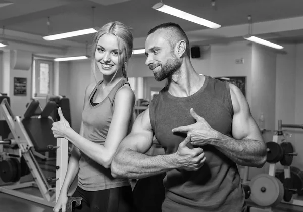 Sport couple on training in the gym. — Stock Photo, Image