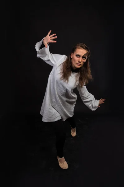 Portrait of the Actress in makeup on a black background. Emotional game — Stock Photo, Image