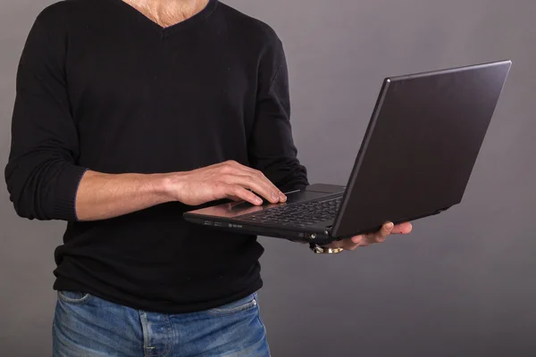 Stylish, successful business man with a laptop — Stock Photo, Image