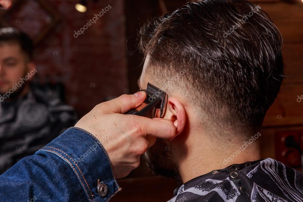 Haircut men Barbershop. Men's Hairdressers; barbers. Barber cuts the client machine for haircuts. Stock Photo by ©aallm 105892164 Haircut men Barbershop. Men's Hairdressers; barbers. Barber cuts the client machine for haircuts. Stock Photo by ©aallm 105892164