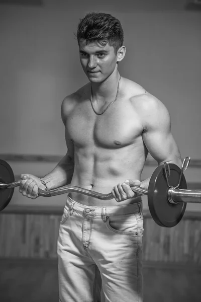 Handsome athletic man posing to the camera — Stock Photo, Image