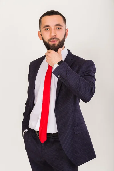 Young stylish businessman in a business suit. — Stock Photo, Image