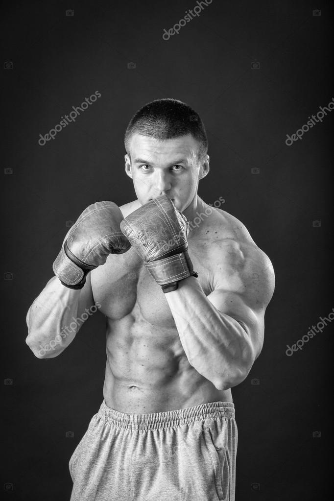 Man, Boxer Winner and Champion after Fight in Gloves on Black Background  Celebraiting Flawless Victory. Fitness and Stock Photo - Image of health,  muscular: 163897408