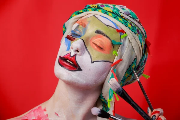 Sanat makyaj. Güzel kadın portre makyajlı, yakın çekim