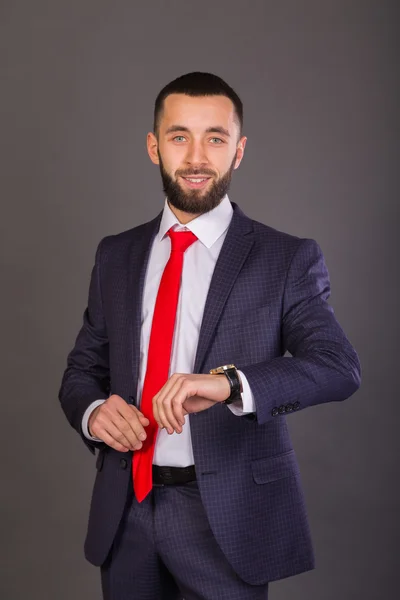 Young stylish businessman in a business suit. — Stock Photo, Image