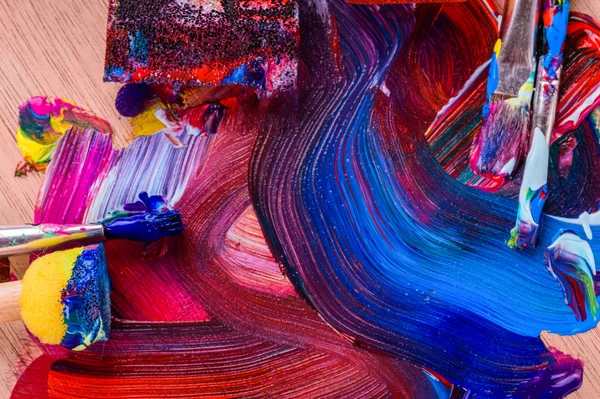 The artist's work. Multi-colored paint on canvas — Stock Photo, Image