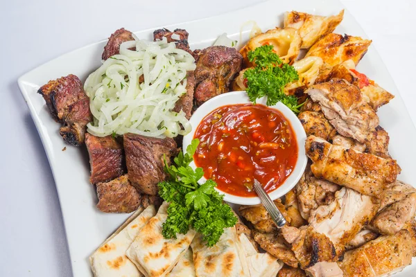 Meat and grilled pita bread — Stock Photo, Image