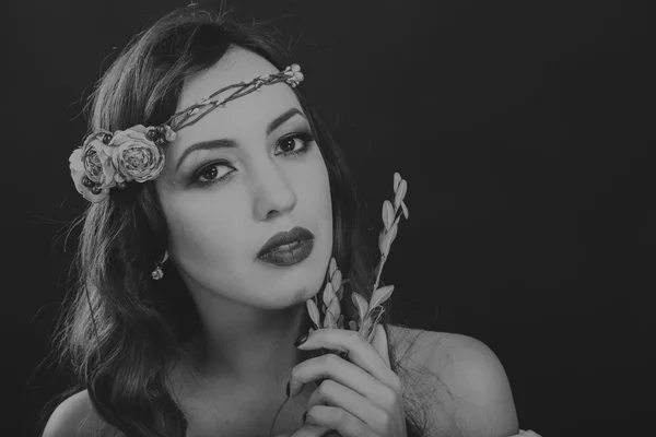 Beautiful, mysterious, cute brunette on a dark background. Black and white photo Beautiful mysterious brunette. — Stock Photo, Image