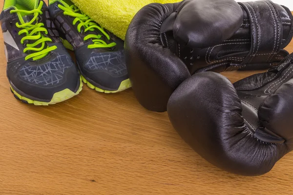 Boxing gloves, a towel and water. All fitness — Stock Photo, Image