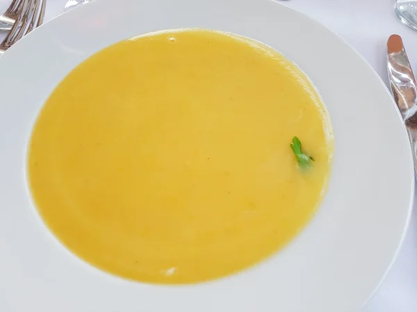 Cream soup in a white plate — Stock Photo, Image