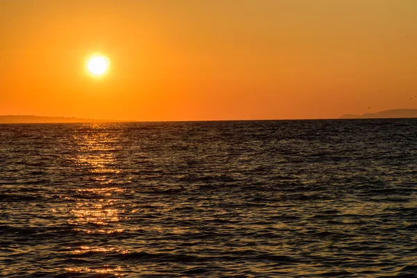 Gyönyörű naplemente a tengerparton, Kréta — Stock Fotó